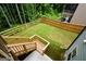 View of backyard with wooden fence, stairs leading to upper deck and lawn at 302 Aspen Valley Ln, Dallas, GA 30157