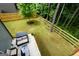 Spacious backyard features a patio with outdoor seating and a new wooden fence at 302 Aspen Valley Ln, Dallas, GA 30157