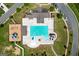 Aerial view of large community pool surrounded by lounge chairs and recreational facilities at 302 Aspen Valley Ln, Dallas, GA 30157
