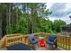 Inviting outdoor deck with seating and wooded views at 302 Aspen Valley Ln, Dallas, GA 30157