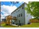 Exterior view of home showing deck, patio, fenced yard and landscaping at 302 Aspen Valley Ln, Dallas, GA 30157
