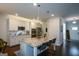 Modern kitchen with a large island and stainless steel appliances, ideal for cooking and entertaining at 302 Aspen Valley Ln, Dallas, GA 30157