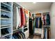 Organized walk-in closet with shelving, hanging racks, and storage baskets offering plenty of storage space at 302 Aspen Valley Ln, Dallas, GA 30157