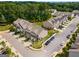 Stunning aerial view of homes showcasing well-manicured lawns and tree-lined streets at 2829 Wild Laurel Ct, Norcross, GA 30071