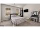 Bright bedroom with dual windows and a stylish vanity for a cozy and functional space at 2829 Wild Laurel Ct, Norcross, GA 30071