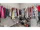 Walk-in closet with ample hanging space and shelving for optimal organization at 2829 Wild Laurel Ct, Norcross, GA 30071