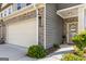 View of the garage and covered entry at 2829 Wild Laurel Ct, Norcross, GA 30071