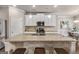 Spacious kitchen with granite countertops, white cabinets, and stainless steel appliances at 2829 Wild Laurel Ct, Norcross, GA 30071