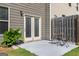 Private patio area with neutral tones offers a relaxing spot for outdoor seating at 2829 Wild Laurel Ct, Norcross, GA 30071