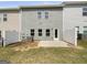 Spacious backyard with a concrete patio and fence, perfect for outdoor entertaining and relaxation at 36 Crescent Chase, Dallas, GA 30157