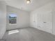Bright bedroom with two closets and a large window at 36 Crescent Chase, Dallas, GA 30157