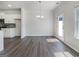Open concept dining room with wood flooring and ample natural light at 36 Crescent Chase, Dallas, GA 30157