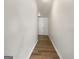 Hallway with wood flooring leading to the front door at 36 Crescent Chase, Dallas, GA 30157
