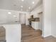 Modern kitchen with granite countertops, stainless steel appliances, and white cabinets at 36 Crescent Chase, Dallas, GA 30157