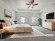 Tranquil, virtually staged primary bedroom featuring a tray ceiling, plush carpet, and ample natural light at 36 Crescent Chase, Dallas, GA 30157