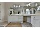 Bathroom featuring dual vanities, a large mirror, and plenty of counter space at 5245 Cottage Farm Rd, Johns Creek, GA 30022