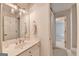 Bright bathroom featuring a white vanity, modern lighting, and neutral tones offering a clean and relaxing space at 5245 Cottage Farm Rd, Johns Creek, GA 30022