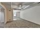 A carpeted bedroom features a ceiling fan, recessed lighting, and a window at 5245 Cottage Farm Rd, Johns Creek, GA 30022