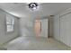 Bedroom features neutral carpet and a window at 5245 Cottage Farm Rd, Johns Creek, GA 30022