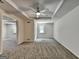 A carpeted bedroom features a ceiling fan, recessed lighting, and a window at 5245 Cottage Farm Rd, Johns Creek, GA 30022