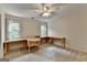 Bedroom with neutral carpet, ceiling fan, and windows at 5245 Cottage Farm Rd, Johns Creek, GA 30022