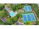 Overhead shot displaying the pool, tennis courts and playground, providing ample recreational opportunities at 5245 Cottage Farm Rd, Johns Creek, GA 30022