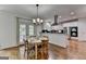 Eat-in kitchen area boasts stainless appliances and light-filled breakfast room at 5245 Cottage Farm Rd, Johns Creek, GA 30022