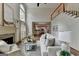 The living room features a fireplace, high ceilings, and an open floor plan at 5245 Cottage Farm Rd, Johns Creek, GA 30022