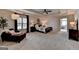 Spacious main bedroom suite features a tray ceiling, sitting area, and ensuite bathroom at 5245 Cottage Farm Rd, Johns Creek, GA 30022