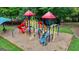 Colorful aerial view of a well-maintained playground with slides and climbing structures at 5245 Cottage Farm Rd, Johns Creek, GA 30022