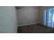 Carpeted bedroom with sliding glass door access to outdoors at 9230 Melody Sw Cir, Covington, GA 30014