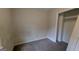 A cozy bedroom features neutral walls, carpeted floors, and a closet for storage at 9230 Melody Sw Cir, Covington, GA 30014