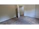 Cozy bedroom with neutral carpet and ample natural light at 9230 Melody Sw Cir, Covington, GA 30014