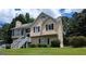 Charming two-story home with a manicured lawn, offering curb appeal at 9230 Melody Sw Cir, Covington, GA 30014