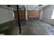 Spacious garage with concrete flooring and dual garage doors at 9230 Melody Sw Cir, Covington, GA 30014