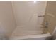 Clean bathtub with stainless steel fixtures at 9230 Melody Sw Cir, Covington, GA 30014