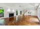 Bright living room with hardwood floors and a fireplace at 750 Crest Valley Nw Dr, Sandy Springs, GA 30327