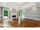 Bright living room with a fireplace and exterior access at 750 Crest Valley Nw Dr, Sandy Springs, GA 30327