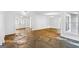 Open-concept living room with flagstone flooring and a large entryway at 750 Crest Valley Nw Dr, Sandy Springs, GA 30327