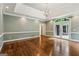 Large living room with bright light and hardwood floors at 750 Crest Valley Nw Dr, Sandy Springs, GA 30327