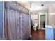 Bathroom features a shower/tub combo with wood-look flooring and a vanity at 4236 Florida Nw Ave, Atlanta, GA 30360