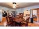 Classic dining room with wooden furniture, stainless steel fridge, and ample natural light at 4236 Florida Nw Ave, Atlanta, GA 30360