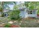 Charming home with a covered porch and lush landscaping, perfect for outdoor enjoyment at 4236 Florida Nw Ave, Atlanta, GA 30360