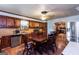 Traditional eat-in kitchen featuring wood cabinetry, stainless steel appliances, and ample dining space at 4236 Florida Nw Ave, Atlanta, GA 30360
