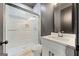 Modern bathroom with white tile shower and vanity at 103 Maddox Rd, Buford, GA 30518