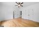 Hardwood floored bedroom, closets, and bright neutral color palette at 103 Maddox Rd, Buford, GA 30518