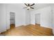 Spacious bedroom with hardwood floors, closet, and neutral wall paint at 103 Maddox Rd, Buford, GA 30518