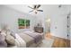 Bright bedroom offering wood floors, closet space, and natural light at 103 Maddox Rd, Buford, GA 30518