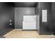 Dog washing station featuring a step-in marble shower and handheld showerhead at 103 Maddox Rd, Buford, GA 30518