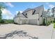 Spacious three-car garage and large driveway with ample parking at this beautiful home at 103 Maddox Rd, Buford, GA 30518